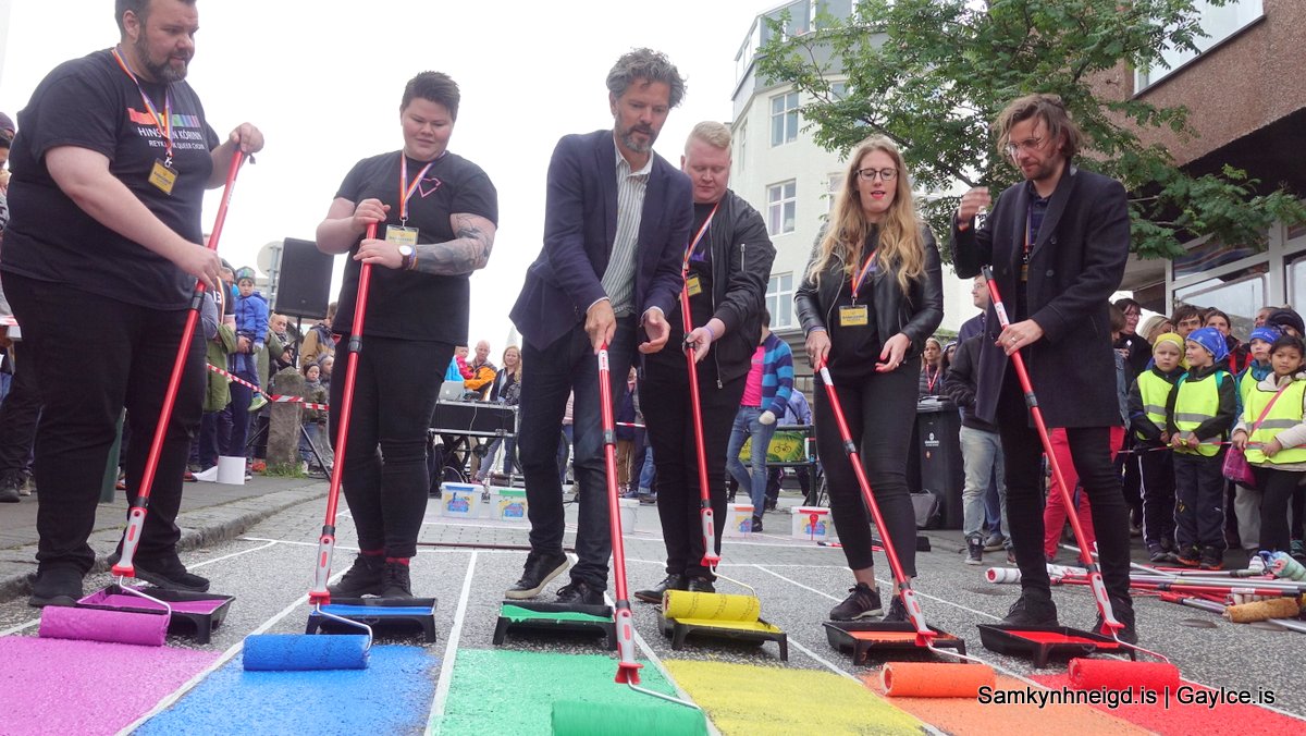 The mayor of Reykjavik paints a street in the colors of Pride